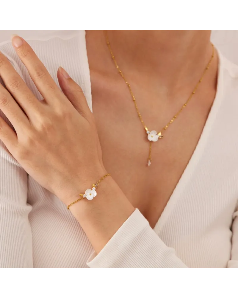 Bransoletka na rękę stal chirurgiczna pozłacana 14k złotem, biały kwiat, cyrkonia BST1516 Bransoletka na rękę stal chirurgiczna pozłacana 14k złotem, biały kwiat, cyrkonia BST1516